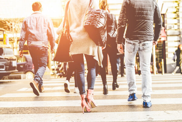 people crossing road on pedestrian crossing
